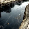 Sông Đoan Túc dòng nước đen kịt, bốc mùi nồng nặc. (Ảnh minh họa. Nguồn: Thế Duyệt/TTXVN)