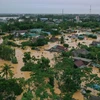 Nhiều ngôi nhà bị ngập do mưa lũ ở huyện Cam Lộ, tỉnh Quảng Trị. (Nguồn ảnh: TTXVN)