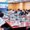 Bộ trưởng Bộ Tài nguyên và Môi trường làm việc với Đoàn công tác của Ngân hàng Thế giới về việc dự án VILG. (Ảnh: TV/Vietnam+)