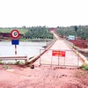 Cảnh báo sạt lở trên thân đập hồ Đắk N’ting, huyện Đăk G’long, tỉnh Đắk Nông. (Ảnh: Vietnam+ phát)