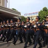 Lực lượng vũ trang diễu binh, diễu hành qua các tuyến phố Hà Nội. (Ảnh: Nhóm PV/Vietnam+)