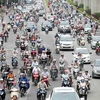 Xe môtô, xe máy sẽ được thực hiện kiểm tra khí thải trước mắt tại 5 thành phố lớn theo lộ trình. (Ảnh: Doãn Đức/Vietnam+)