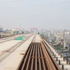 Phiến dầm cuối cùng trong tổng số 806 phiến của dự án đường sắt đô thị Cát Linh-Hà Đông đã được hợp long. (Ảnh: Doãn Đức/Vietnam+)
