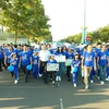 Đoàn diễu hành gồm gần 4.000 em học sinh, phụ huynh, thầy cô giáo và người dân địa phương kêu gọi đội mũ bảo hiểm cho trẻ em. (Ảnh: Yamaha cung cấp)