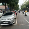 Ôtô đã được chuyển từ đỗ chéo sang đỗ dọc trên tuyến phố Trần Hưng Đạo. (Ảnh: Nguyễn Hằng/Vietnam+)