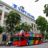 Chiếc xe buýt 2 tầng đầu tiên mang tên City Tour đã được chạy thử nghiệm trên đường phố Hà Nội. (Ảnh: Minh Sơn/Vietnam+)