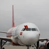 Chuyên cơ của hãng hàng không Vietjet chở đội tuyển U23 Việt Nam về nước. (Ảnh: Minh Sơn/Vietnam+)