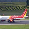 Máy bay của hãng hàng không Vietjet hạ cánh xuống sân bay quốc tế Changi tại Singapore. (Ảnh: Vietjet cung cấp)