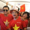 Cổ động viên đều bày tỏ niềm vui, tự hào khi Olympic Việt Nam đã tiến bộ vượt bậc về trình độ và tâm thế sau khi lập kỳ tích lần đầu vào bán kết ASIAD. (Ảnh: Việt Hùng/Vietnam+)