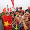 Ai ai cũng hào hứng và tự hào với chiến tích lịch sử lọt vào top 4 của Olympic Việt Nam. (Ảnh: PV/Vietnam+) 