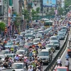 Ùn tắc giao thông tại các đô thị là “căn bệnh” nhức nhối đối với nhiều người dân thủ đô. (Ảnh: PV/Vietnam+)
