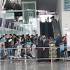 Sân bay Nội Bài tiếp tục thực hiện hạn chế người đưa tiễn cao điểm Tết Nguyên đán Kỷ Hợi. (Ảnh: Như Hà/Vietnam+)