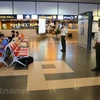 Nhân viên an ninh hàng không Cảng hàng không quốc tế Nội Bài. (Ảnh: Việt Hùng/Vietnam+)
