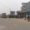 Hiện trường vụ tai nạn giao thông làm 7 người chết tại tỉnh Vĩnh Phúc. (Ảnh: TTXVN) 