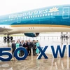 Lễ ra mắt máy bay Airbus A350-900 thứ 14 của Vietnam Airlines diễn ra dưới sự chứng kiến của Chủ tịch Quốc hội Việt Nam Nguyễn Thị Kim Ngân và các đại biểu trong Đoàn cấp cao Quốc hội Việt Nam. (Ảnh: Anh Tuấn)