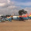 Máy bay của hãng hàng không Vietnam Airlines và Vietjet Air. (Ảnh: Việt Hùng/Vietnam+)