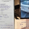 Biên bản xử phạt xe taxi chặt chém du khách nước ngoài. (Ảnh: CTV/Vietnam+)