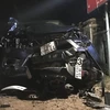Hiện trường vụ tai nạn xe ôtô và xe máy hư hỏng nặng làm 4 người tử vong và 3 người bị thương tại Phú Yên. (Ảnh: Phạm Cường/TTXVN)