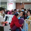 Sân bay Nội Bài kiểm soát chặt nguy cơ lây nhiễm virus corona. (Ảnh: Phan Công/Vietnam+)