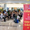 Khu vực khách chờ làm thủ tục nhập cảnh tại sân bay Nội Bài. (Ảnh: Phan Công/Vietnam+)