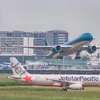 Hành khách sẽ được phục vụ tiêu chuẩn ngang nhau nhờ thương hiệu kép Vietnam Airlines-Jetstar Pacific. (Ảnh: CTV/Vietnam+)
