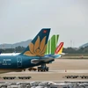 Máy bay của các hãng hàng không tại sân bay Nội Bài. (Ảnh: Hoàng Anh/Vietnam+)