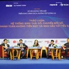 Các đại biểu tham dự tại hội thảo trong khuôn khổ chương trình Ngày không tiền mặt 2020. (Ảnh: CTV/Vietnam+)