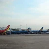 Máy bay của các hãng hàng không Việt Nam tại Cảng hàng không. (Ảnh: Việt Hùng/Vietnam+)