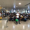 Hành khách tại sân bay Tân Sơn Nhất. (Ảnh: Việt Hùng/Vietnam+)