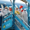 Bác sỹ và nhân sự chống dịch COVID-19 sẽ được Vietnam Airlines vận chuyển miễn phí nhằm sớm đẩy lùi dịch bệnh. (Ảnh: CTV/Vietnam+)