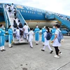 Vietnam Airlines bố trí chuyến bay riêng chở 300 lực lượng y tế vào chi viện chống dịch cho Thành phố Hồ Chí Minh. (Ảnh: CTV/Vietnam+)