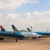 Máy bay của hai hãng hàng không Vietnam Airlines và Pacific Airlines. (Ảnh: CTV/Vietnam+)