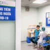 Nhân viên Vietnam Airlines được tiêm vaccine COVID-19. (Ảnh: CTV/Vietnam+)