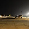 Máy bay của các hãng hàng không tạm dừng hoạt động nằm la liệt tại sân bay Nội Bài. (Ảnh: CTV/Vietnam+)