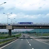 Phương tiện lưu thông trên dự án đường cao tốc Nội Bài-Lào Cai. (Ảnh: Việt Hùng/Vietnam+)