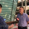 Đại biểu Quốc hội Nguyễn Lân Hiếu trao đổi với phóng viên bên lề Kỳ họp thứ hai, Quốc hội khóa XV. (Ảnh: Xuân Quảng/Vietnam+)
