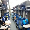 Từ 31/10, hành khách đi tàu hỏa chỉ cần khai báo y tế điện tử trên PC-COVID. (Ảnh: CTV/Vietnam+)