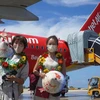 Hãng hàng không Vietjet chào đón những du khách Hàn Quốc tới đất nước Việt Nam. (Ảnh: CTV/Vietnam+)