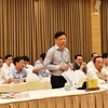 Thứ trưởng Bộ Giao thông Vận tải Nguyễn Xuân Sang trả lời câu hỏi tại buổi họp báo Chính phủ thường kỳ tháng Bảy. (Ảnh: PV/Vietnam+)