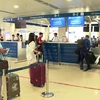 Hành khách ký gửi hành lý tại một sân bay nội địa. (Ảnh: CTV/Vietnam+)