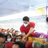 Hành khách sẽ có nhiều cơ hội cho người dân đi lại trên các đường bay nội địa và quốc tế của Vietjet. (Ảnh: CTV/Vietnam+)
