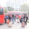 Các bến xe tại thành phố Hà Nội đông đúc hành khách đổ về sau kỳ nghỉ Tết Nguyên đán Quý Mão 2023. (Ảnh: Việt Hùng/Vietnam+)