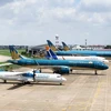 Máy bay của các hãng hàng không Vietnam Airlines, Pacific Airlines và VASCO tại sân bay Nội Bài. (Ảnh: CTV/Vietnam+)
