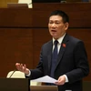 Bộ trưởng Bộ Tài chính Hồ Đức Phớc giải trình, làm rõ một số vấn đề Đại biểu Quốc hội nêu tại Kỳ họp thứ 5, Quốc hội khóa XV. (Ảnh: An Đăng/TTXVN)