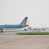 Máy bay di chuyển trên đường cất hạ cánh, đường lăn sân bay Nội Bài. (Ảnh: Việt Hùng/Vietnam+)