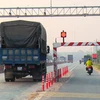 Trạm cân tự động tại tuyến đường tỉnh 741 Bình Dương do Elcom triển khai đã được Bộ Giao thông Vận tải đồng ý đưa vào thí điểm phạt nguội. (Ảnh: CTV/Vietnam+)