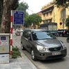 Điểm trông giữ xe dưới lòng đường tại một tuyến phố của thành phố Hà Nội. (Ảnh: Việt Hùng/Vietnam+)