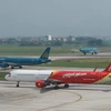 Máy bay của các hãng hàng không Việt Nam tại một sân bay nội địa. (Ảnh: Việt Hùng/Vietnam+)