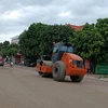Nhà thầu thi công nền đường một dự án quốc lộ. (Ảnh: Việt Hùng/Vietnam+)