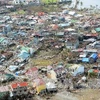 Cảnh tàn phá tại Tacloban sau siêu bão Haiyan. (Nguồn: AFP/TTXVN)